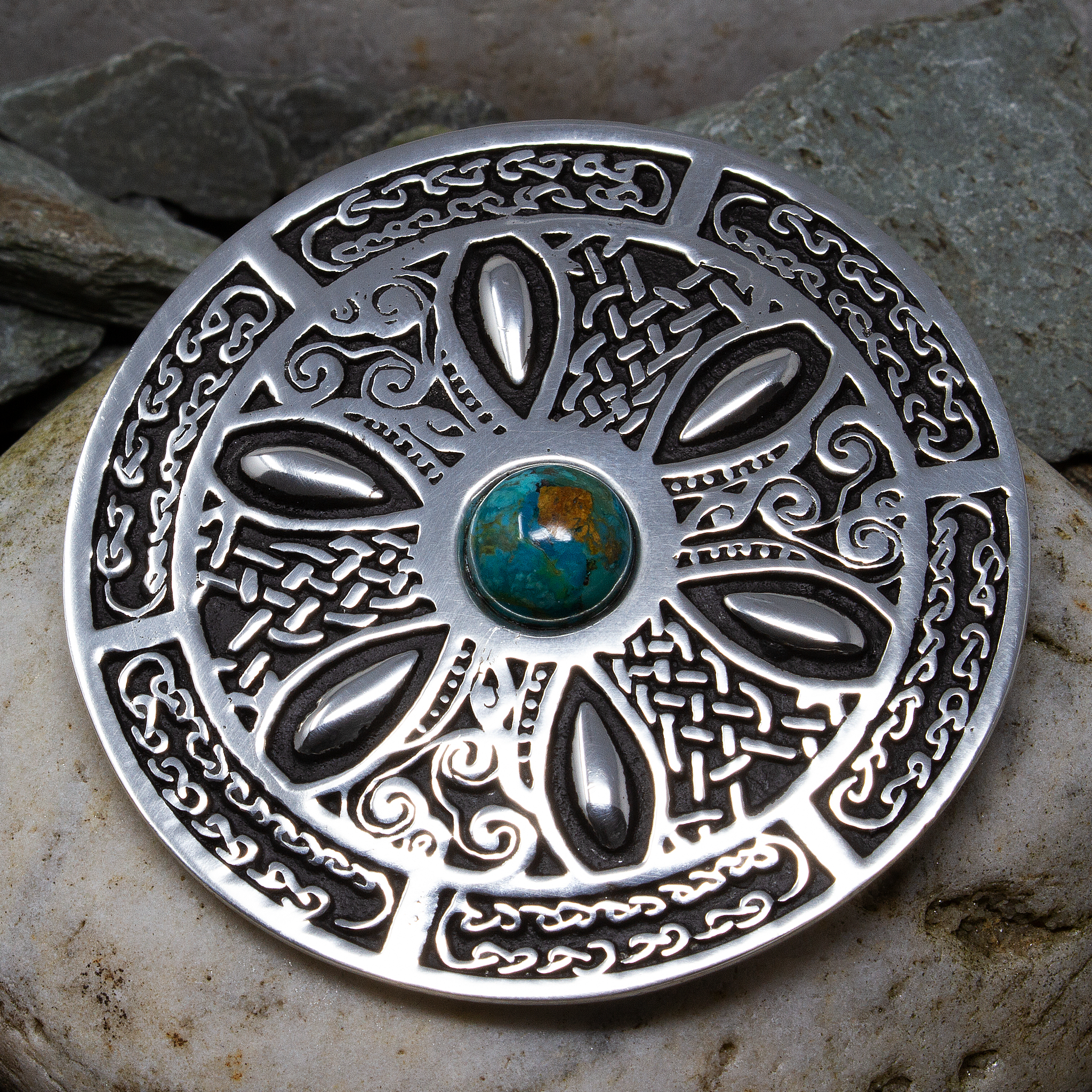 A turquoise celtic brooch from Eyres Jewellery