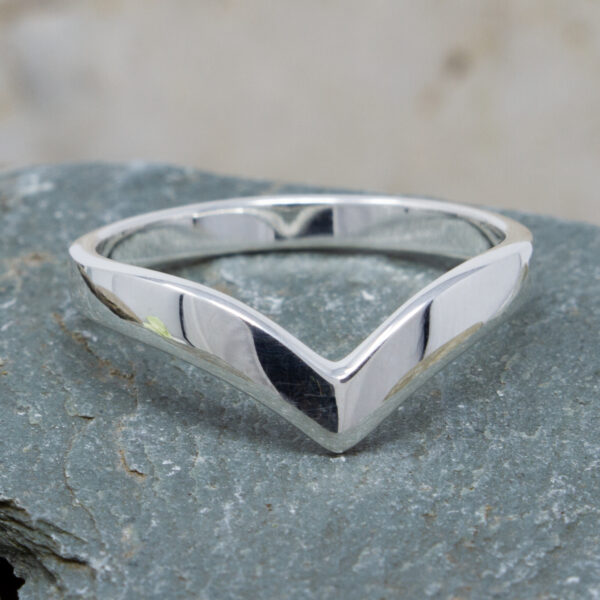 A lovely simple ring fashioned into the shape of a wishbone.