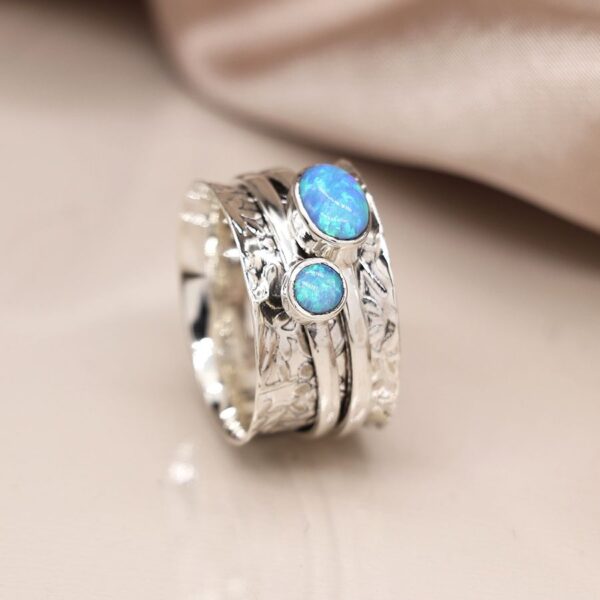 Silver Spinning Ring With Leaf Detail and Opalised Glass